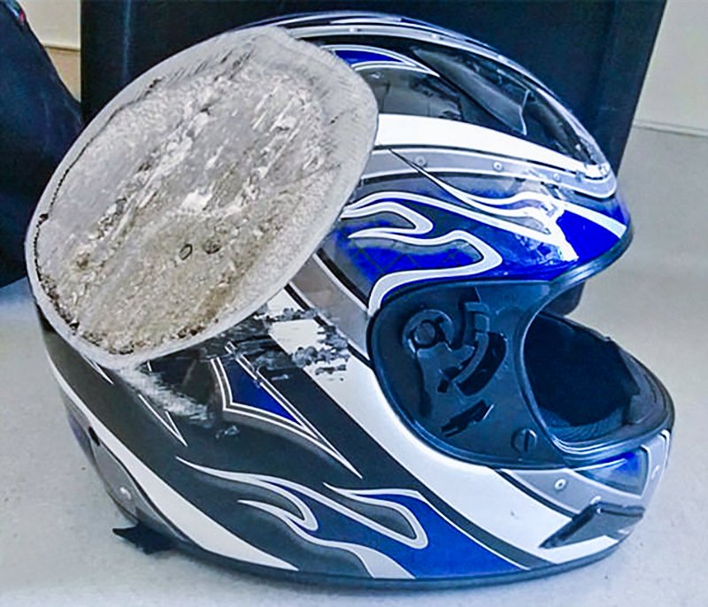 Extremely damaged motorcycle helmet
